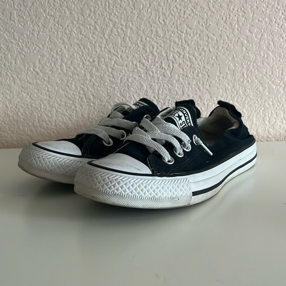 Black low top loose lace Converse